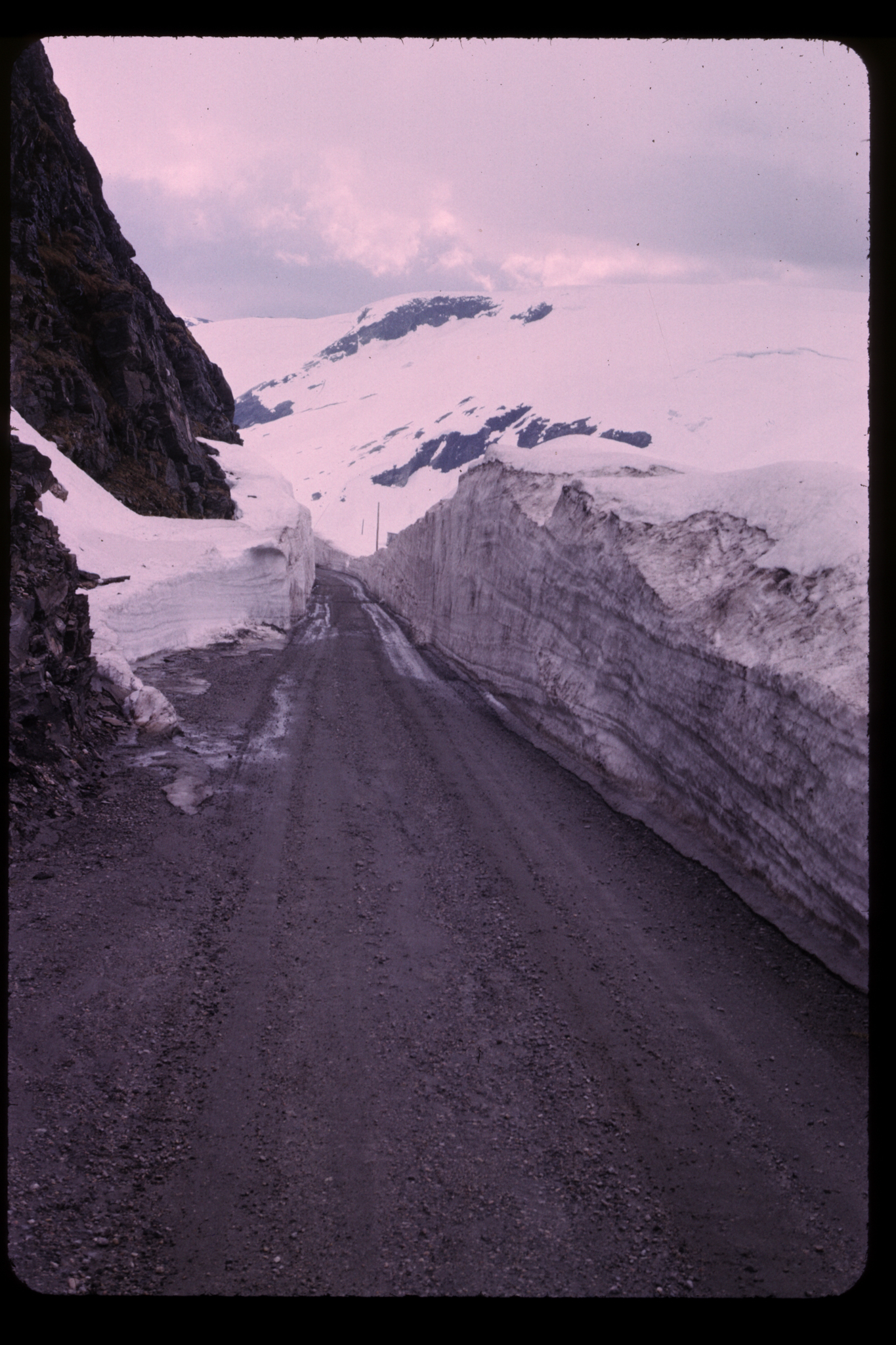 4ft_drifts_along_mountain_road_in_june_road_clear_and_dry.jpg